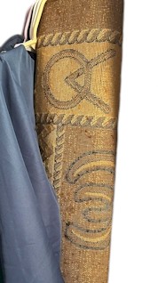 Southwestern style rolled rug